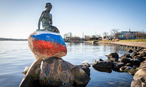 The Little Mermaid in Copenhagen after its plinth has been vandalised with the Russian flag