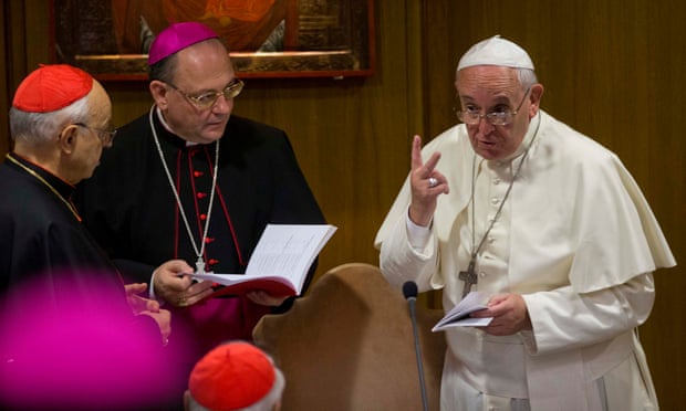 Pope Francis talks to prelates a session of the synod on family issues last October.