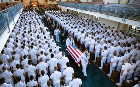 The casket of John McCain is carried during his funeral service.