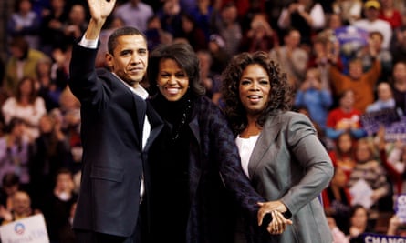 Oprah Winfrey appears alongside Barack and Michelle Obama at a rally in Manchester, New Hampshire, in support of Obama’s presidential run.