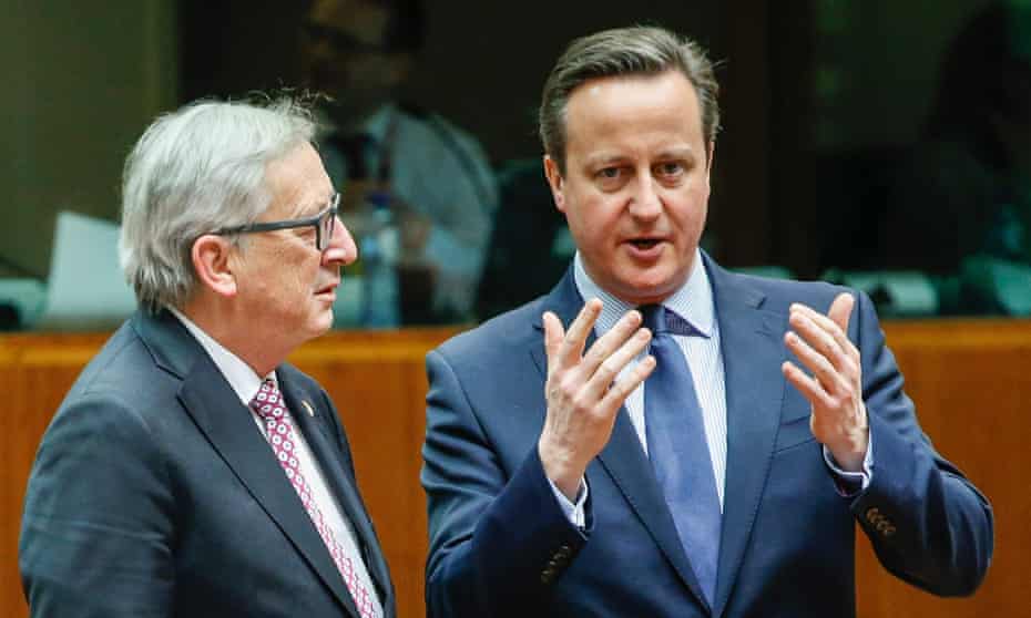 European commission president Jean-Claude Juncker (L) speaks with David Cameron at the start of the EU summit on 18 February 2016 in Brussels
