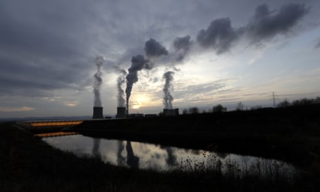 Smoke rises from chimneys of the Turow power plant  near Bogatynia, Poland
