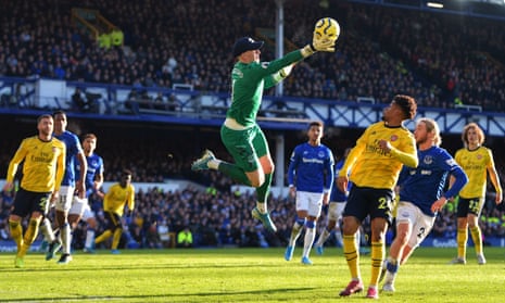 Everton’s Jordan Pickford claims the ball above Reiss Nelson of Arsenal during their goalless draw at Goodison Park