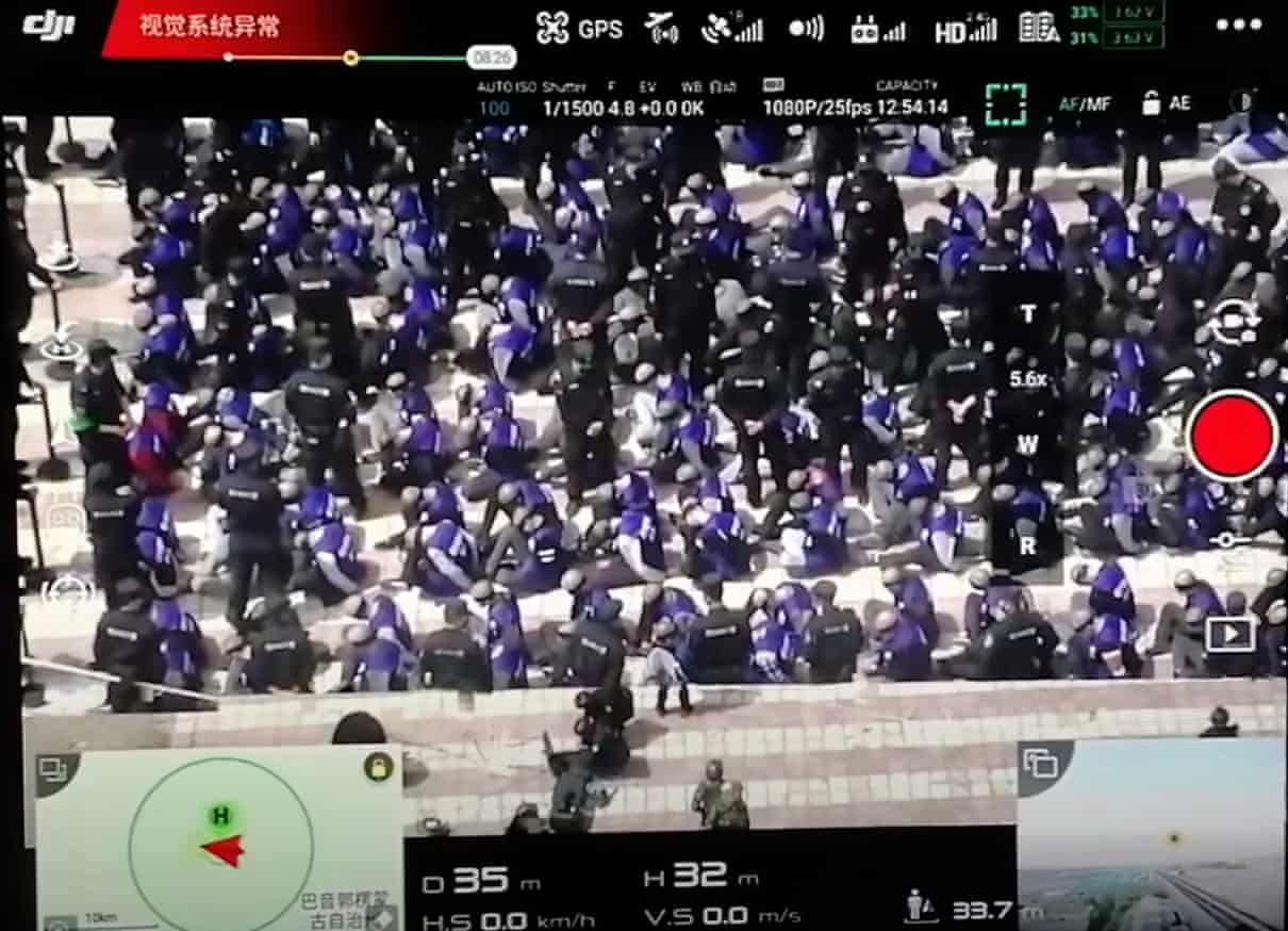 Camera footage appearing to show blindfolded and shackled prisoners Uyghurs, Rights and freedom, Amnesty International, China, Islam, Xinjiang, Harbouchanews