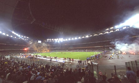 Juventus fans strain to see the action as their team face Roma at the unloved Stadio Delle Alpi.