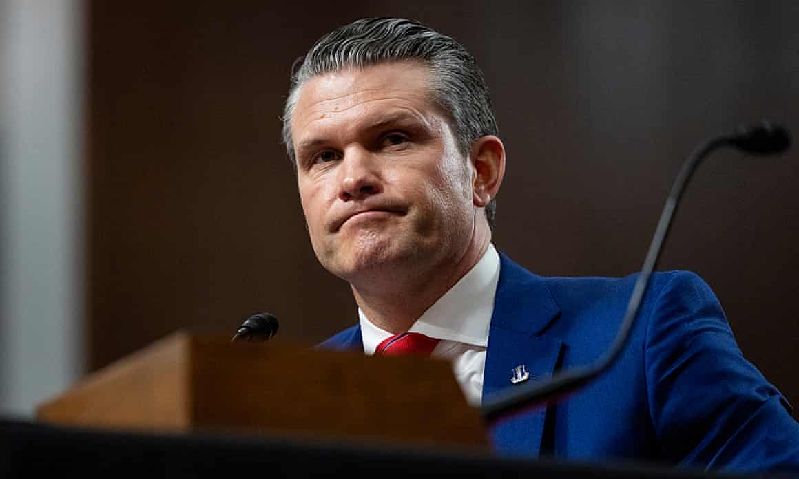 Pete Hegseth standing at a lectern