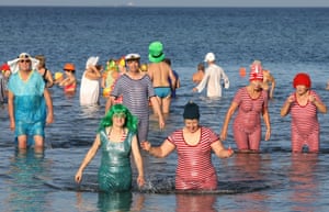 Warnemuende, Germany'Rostock Seals' celebrate the launch of the carnival season with a bath in the Baltic Sea