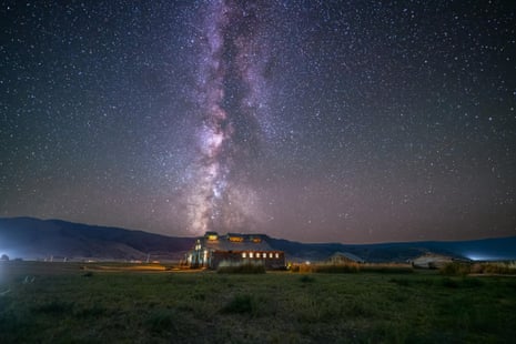 long exposure image of a dark sky with stars