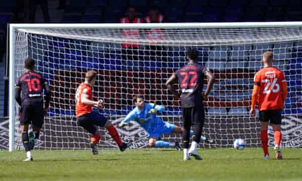 James Collins scores the winner for Luton from the penalty spot.