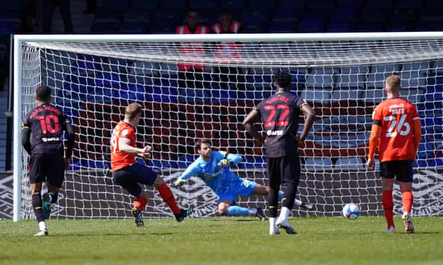 James Collins scores the winner for Luton from the penalty spot.