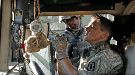 Two soldiers in military gear