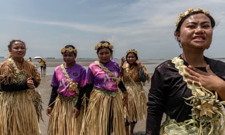 Indigenous people from Malaysia’s Mah Meri perform a thanksgiving to the sea. Asia is one of the region’s most affected by population displacement.