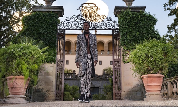 A model walks the runway at a Florentine villa as part of a Givenchy fashion show.