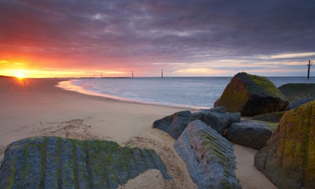 Sunset at Waxham on the Norfolk coast, with its sea defences visible just offshore