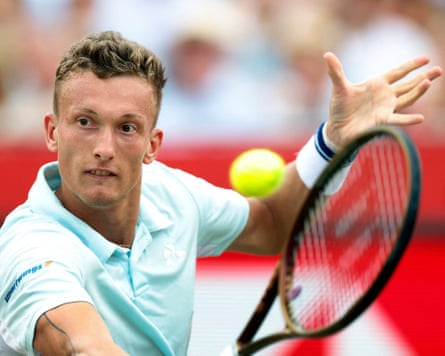 Jiri Lehecka plays a backhand volley