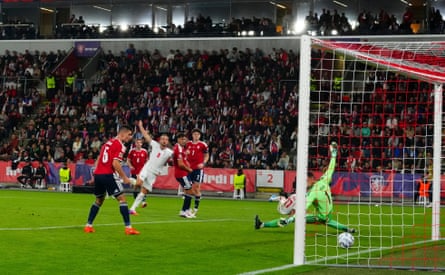 Harry Kane of England scores a goal to make it 2-0 against Czechia.