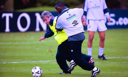 Andy Cole and his fourth England manager, Kevin Keegan, in training.