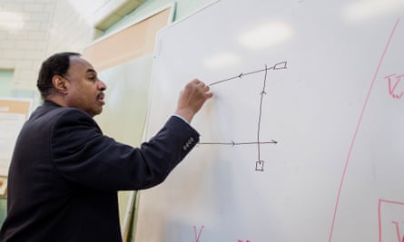 Prof Mallett draws a diagram of his ring laser on a whiteboard at the University of Connecticut, 2015.