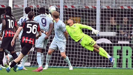 Maduka Okoye makes a diving save during Udinese’s 3-0 away win at Milan in April