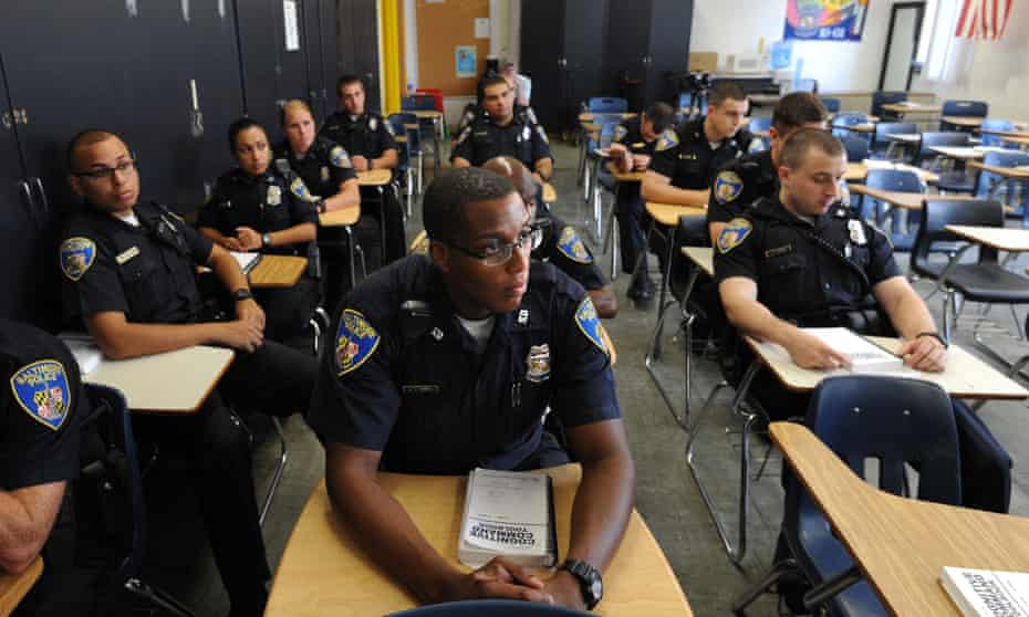 Trainee officers attend the Baltimore city police department professional development and training academy. A consent decree has been credited with bringing critical change to policing in Baltimore.