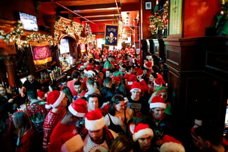 A New York City bar is packed with Santa costume-clad revelers from 2019 SantaCon.