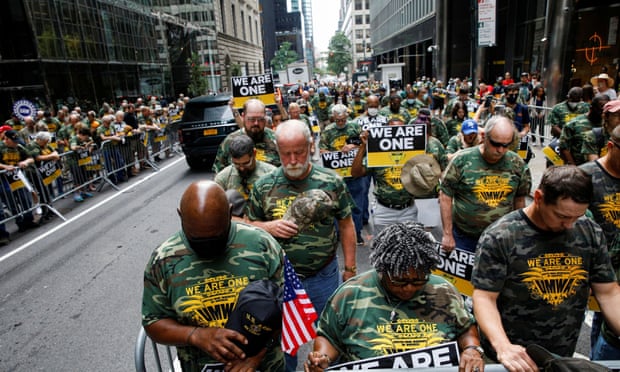 Members of UMWA and other labor leaders picket outside BlackRock’s headquarters in New York on Wednesday.