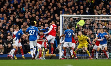 James Tarkowski heads the opener for Everton.
