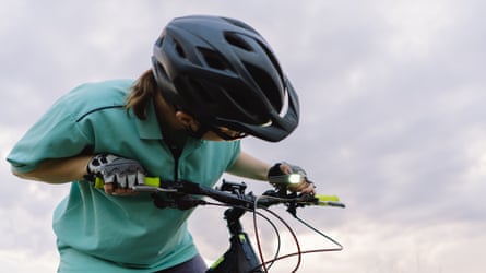 Cyclist riding a upland motorcycle outdoors.