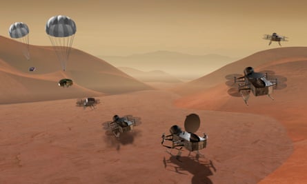 An artist’s rendering shows multiple views of the Dragonfly dual-quadcopter drone that will explore Saturn’s moon Titan.