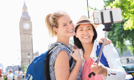 Tourists taking Selfie in front of Big Ben, London