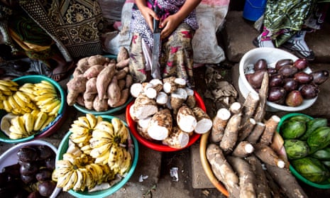 Bowls of fruit and vegetables at a market stall