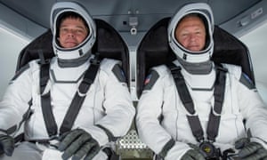 Nasa astronauts Bob Behnken (L) and Doug Hurley participating in a fully integrated test of SpaceX Crew Dragon flight hardware at Cape Canaveral