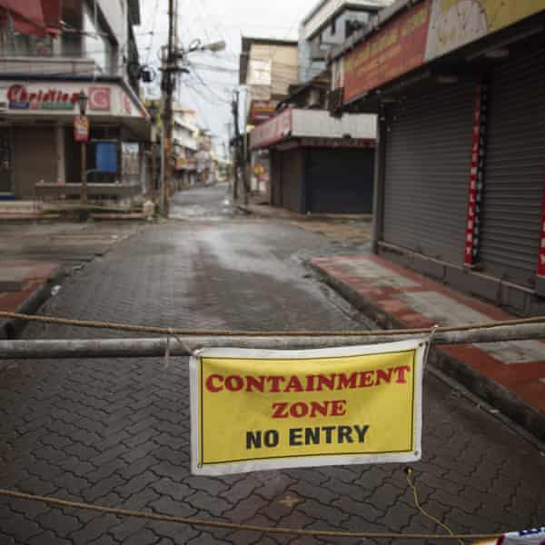 A usually busy market area of Kochi is sealed off