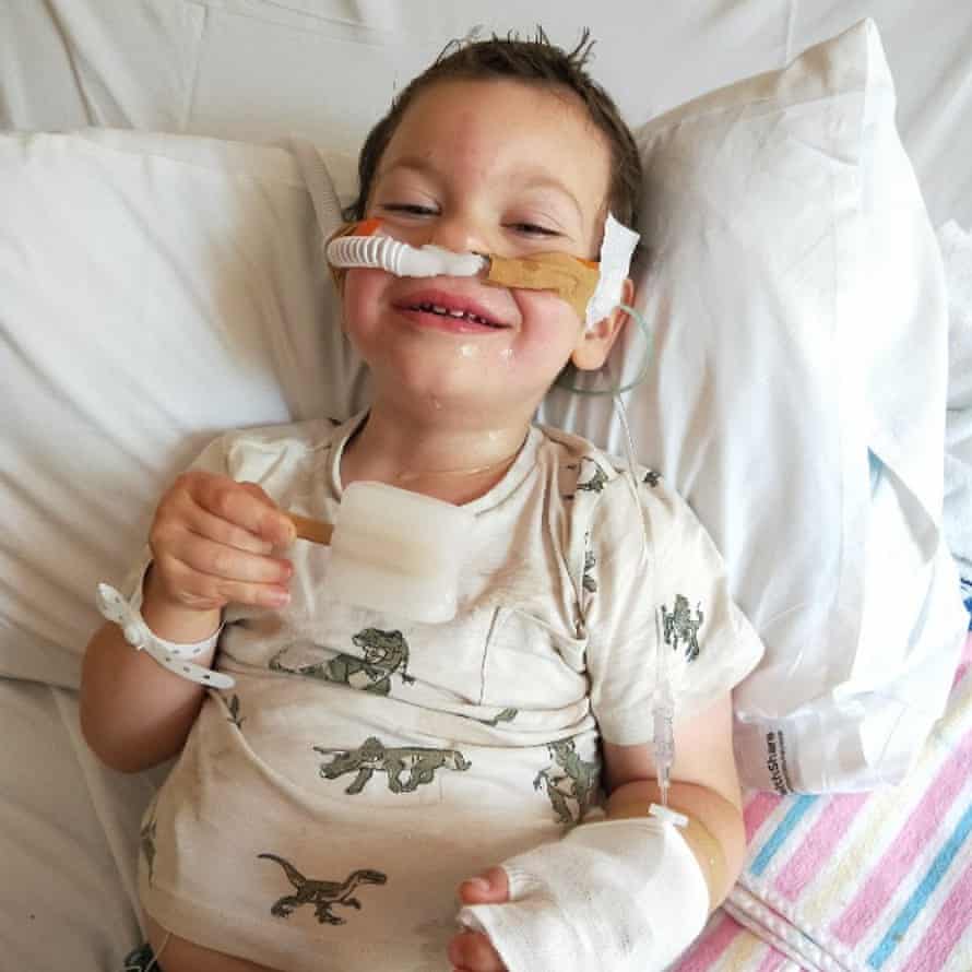 A young boy in a hospital bed