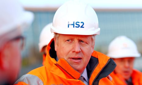 Boris Johnson on building site wearing an HS2 hat
