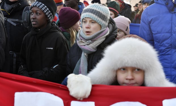 Greta Thunberg, centre, takes part in a climate protest with Sami children in Jokkmokk, Sweden.