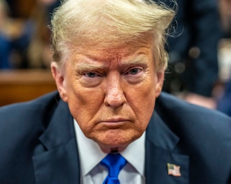 closeup of a man in a blue suit and tie