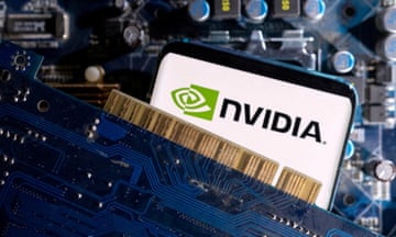 a smartphone with an 'Nvidia' logo on screen on a computer motherboard
