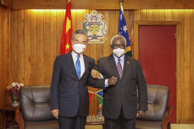 Manasseh Sogavare, right, with visiting Chinese foreign minister Wang Yi in May.