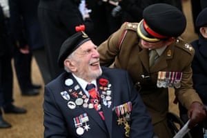 D-Day veteran Joe Cattini, 98 years old, reacts as he attends Horse Guards Parade for the Remembrance Sunday ceremony in London