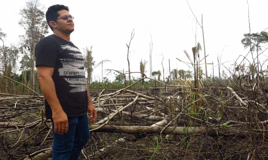 A Rondônia state environmental protection officer Nei Peres looks over a deforested section of land in Jaci Paraná reserve.