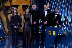 Oleksandr Rudynskyi, Franz Bohm, Hayder Rothschild Hoozeer, cast and crew accept the British short film award for Rock, Paper, Scissors