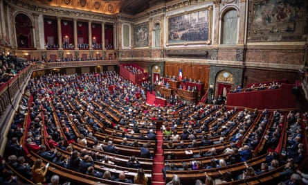 Members of parliament sitting in the ornate Congress Hall