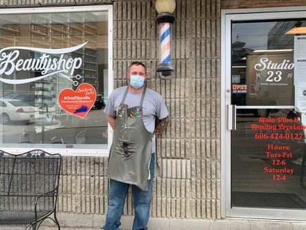 Derek Harris, a barber in Pikeville, whose business is down 20% since re-opening