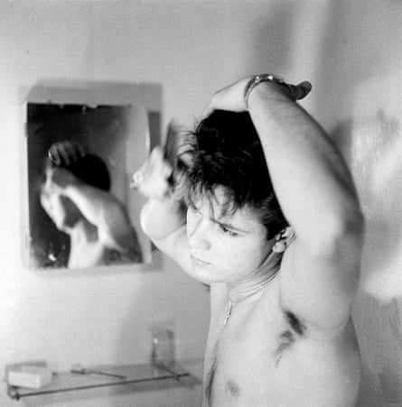 Cliff Richard tries to perfect his Elvis hairdo, circa 1959.