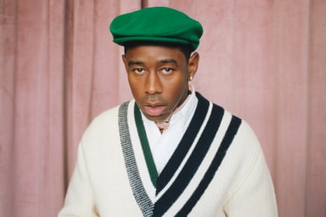 Head shot of Tyler, the Creator, against pink backdrop, photographed in London September 2019