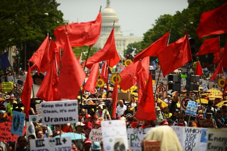 People march from the U.S. Capitol to the White House for the People’s Climate Movement to protest President Donald Trump’s environmental policies.