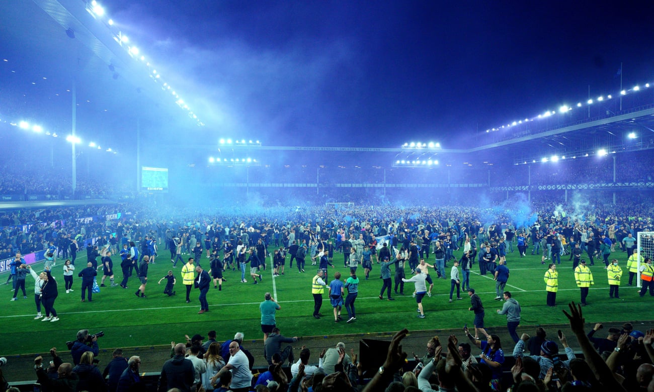 Everton fans storm the Goodison Park after avoiding relegation last season. 