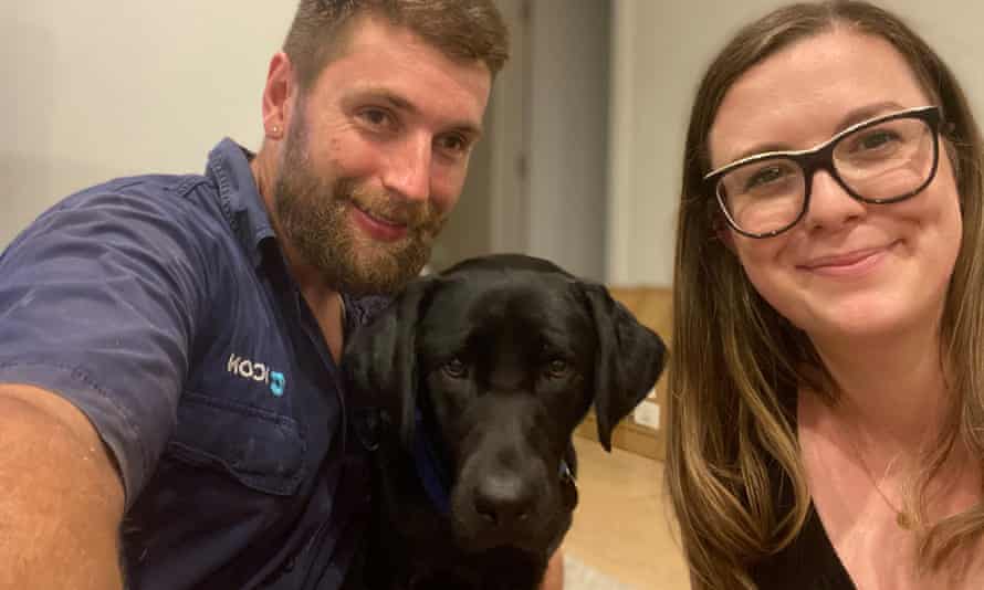 Olivia Purnell and Andrew Maraun with service dog Seren, whom they looked after during Seren's training.