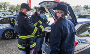 Police in Reggio Calabria check a driver’s documents before allowing the car to enter the region.